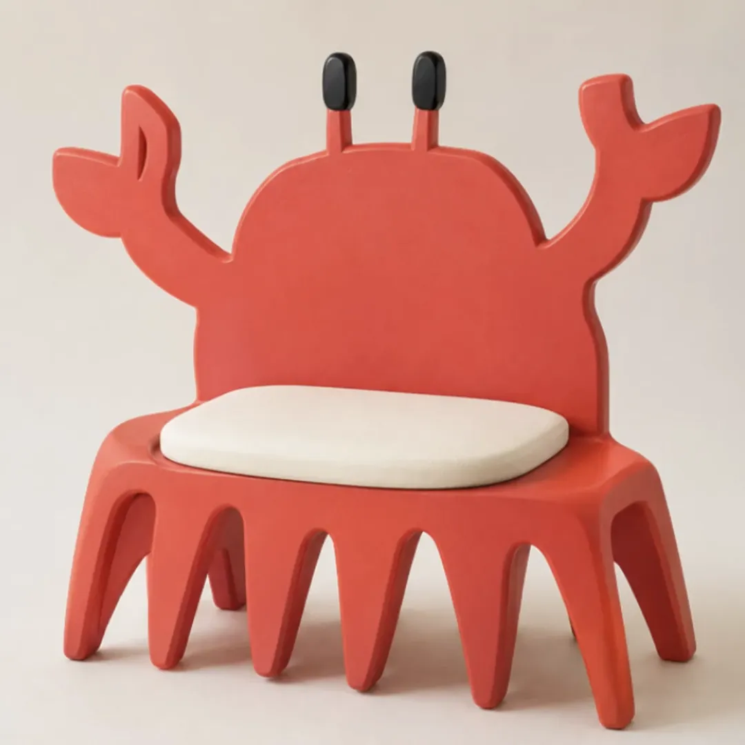 Crab-shaped chair interpreting the red sketch as a physical object