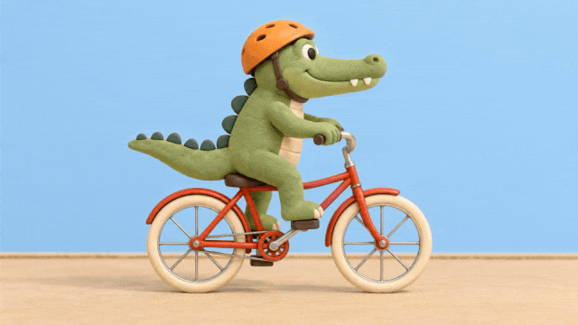 A clay-style crocodile wearing an orange helmet on a red bicycle